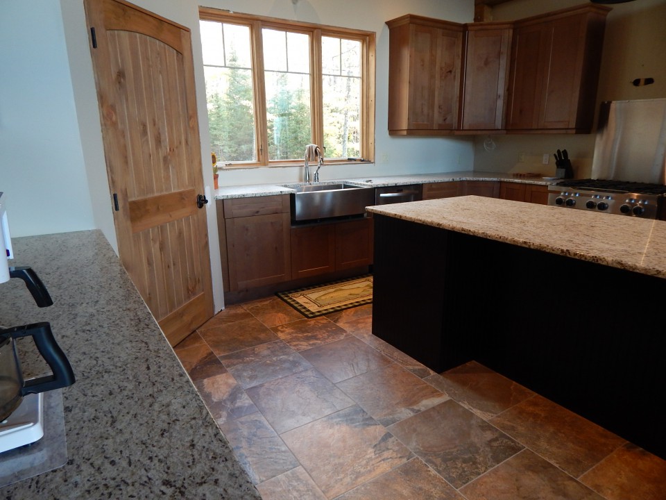 Tiled floor in modern kitchen